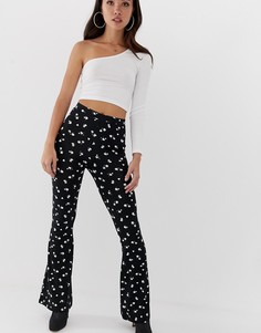 Расклешенные леггинсы с цветочным принтом ASOS DESIGN-Мульти