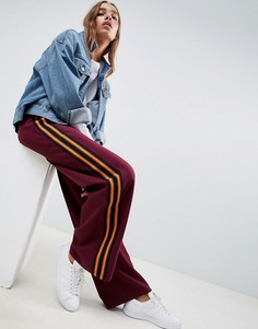 Спортивные приталенные брюки с широкими штанинами ASOS DESIGN Colour Block-Красный