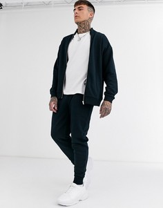 Темно-синий спортивный костюм oversize ASOS DESIGN