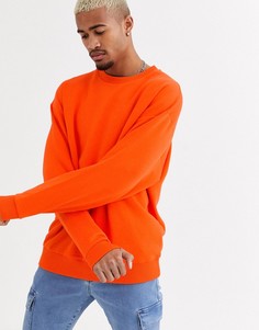 Оранжевый oversize-свитшот ASOS DESIGN