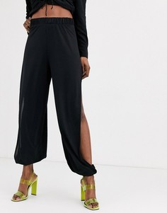 Широкие брюки на манжетах с разрезами ASOS DESIGN-Черный