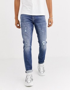 Синие облегающие суженные книзу джинсы Calvin Klein Jeans-Синий