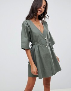 Свободное платье мини на пуговицах с V-образным вырезом на груди и спине ASOS DESIGN-Зеленый