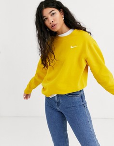 Темно-желтый oversize-свитшот с логотипом-галочкой Nike