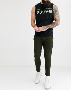 Легкие джоггеры скинни темно-оливкового цвета ASOS DESIGN-Зеленый
