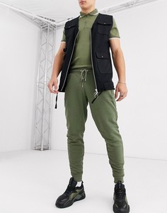 Суженные джоггеры цвета хаки с серебристыми молниями на карманах ASOS DESIGN-Зеленый