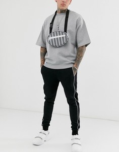 Черные джоггеры скинни с полосами по бокам ASOS DESIGN-Черный