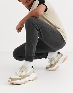 Темно-серые суженные книзу джоггеры ASOS DESIGN-Серый