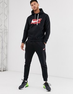Черный спортивный костюм с логотипом-галочкой Nike