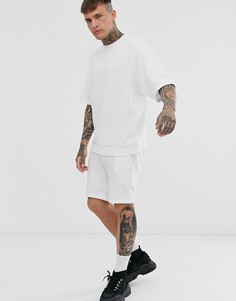 Белый спортивный костюм в стиле oversize с топом с короткими рукавами и шортами ASOS DESIGN