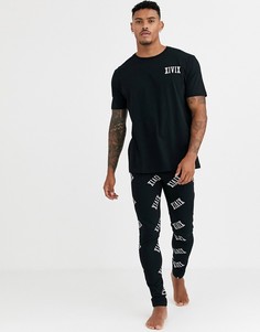Пижамный комплект в монохромной гамме из меггинсов и футболки с принтом римских цифр ASOS DESIGN-Черный
