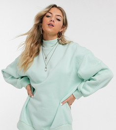 Зеленый трикотажный топ с высоким воротом Bershka