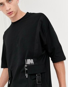 Свободная футболка со светоотражающим принтом на карманах ASOS DESIGN-Черный