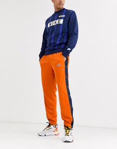 Оранжевые джоггеры с кнопками Nike Heritage-Оранжевый