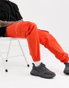 Оранжевые брюки карго ASOS DESIGN-Оранжевый