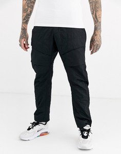 Черные брюки в стиле милитари Nike Tech Pack-Черный