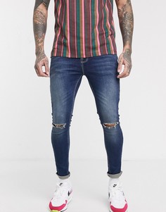 Темно-синие джинсы с напылением и рваной отделкой ASOS DESIGN-Синий