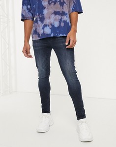 Черно-синие эластичные джинсы с напылением ASOS DESIGN-Синий
