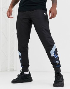 Спортивные брюки с цветочным принтом Puma-Черный