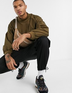 Зеленый нейлоновый свитшот свободного кроя ASOS DESIGN