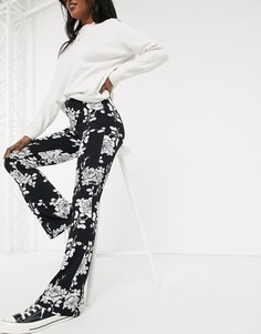 Расклешенные леггинсы с цветочным принтом ASOS DESIGN-Мульти