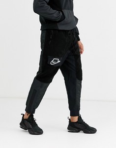 Черные джоггеры в стиле милитари с меховой вставкой и кромкой манжетом Nike Air-Черный