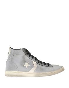 Высокие кеды и кроссовки Converse