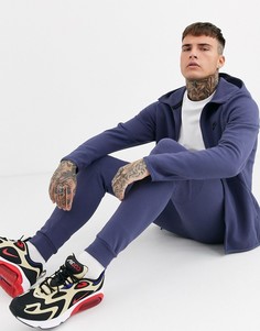 Фиолетовые джоггеры с флисом и манжетами Nike Tech-Фиолетовый