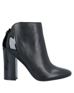Полусапоги и высокие ботинки Guess