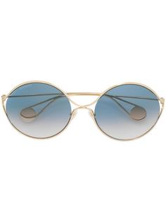 Gucci Eyewear массивные солнцезащитные очки в круглой оправе