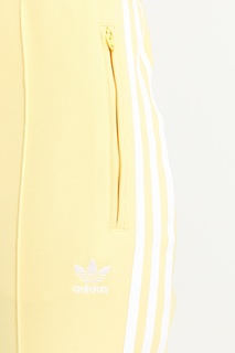 Желтые спортивные брюки SST Adidas