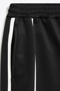 Черные брюки с белыми полосами Helmut Lang
