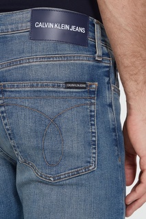 Голубые джинсы с потертостями Calvin Klein