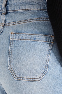 Голубые джинсы с «вареным» эффектом Sandro