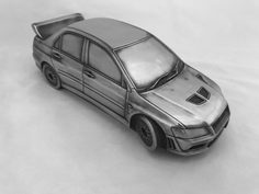 Скульптура-автомобиль Mitsubishi Lancer, металл, 23 см Compulsion Gallery