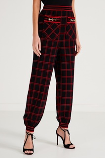 Шерстяные брюки в клетку Gucci