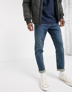 Суженные книзу темно-синие джинсы стретч в винтажном стиле ASOS DESIGN-Синий