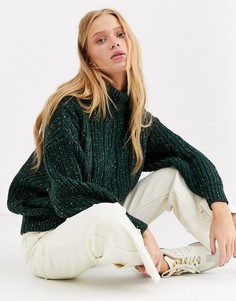 Темно-зеленый вязаный oversize-джемпер с высоким воротником Monki