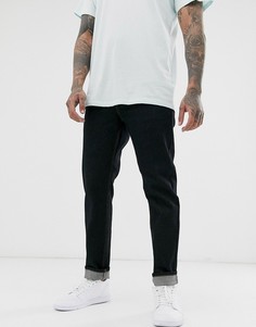Суженные книзу черные джинсы стретч ASOS DESIGN-Черный