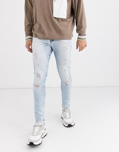 Светлые джинсы стретч с рваной отделкой ASOS DESIGN-Синий
