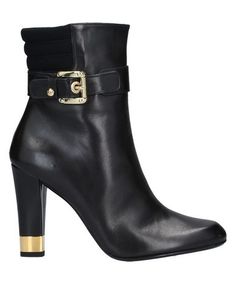 Полусапоги и высокие ботинки Stuart Weitzman