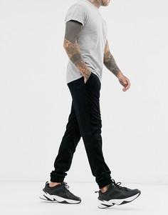 Черные вельветовые джоггеры скинни ASOS DESIGN-Черный