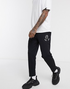 Черные зауженные джоггеры с принтом ASOS DESIGN-Черный