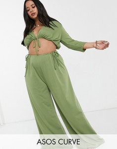 Трикотажные широкие пляжные брюки хаки от комплекта с завязками ASOS DESIGN curve-Зеленый