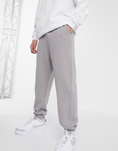 Свободные джоггеры с эффектом кислотной стирки ASOS DESIGN-Серый