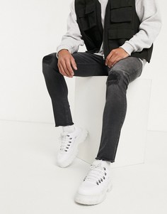 Черные супероблегающие рваные джинсы с необработанным краем ASOS DESIGN-Черный