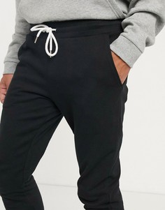 Черные супероблегающие джоггеры с белым шнурком ASOS DESIGN-Черный