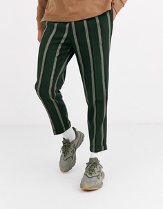 Зеленые зауженные брюки в полоску ASOS DESIGN-Зеленый