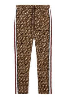 Коричневые брюки с узором из монограмм Burberry