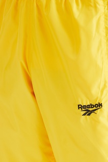 Желтые спортивные брюки Classics Vector Reebok